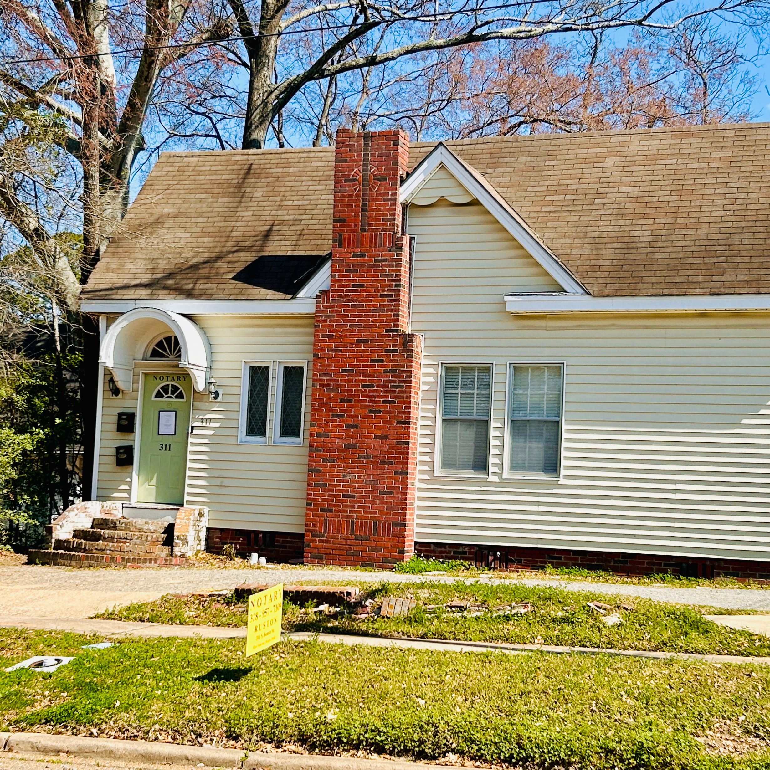 Exterior view of a private notary office in Ruston, Louisiana, located in a residence on historic South Bonner St